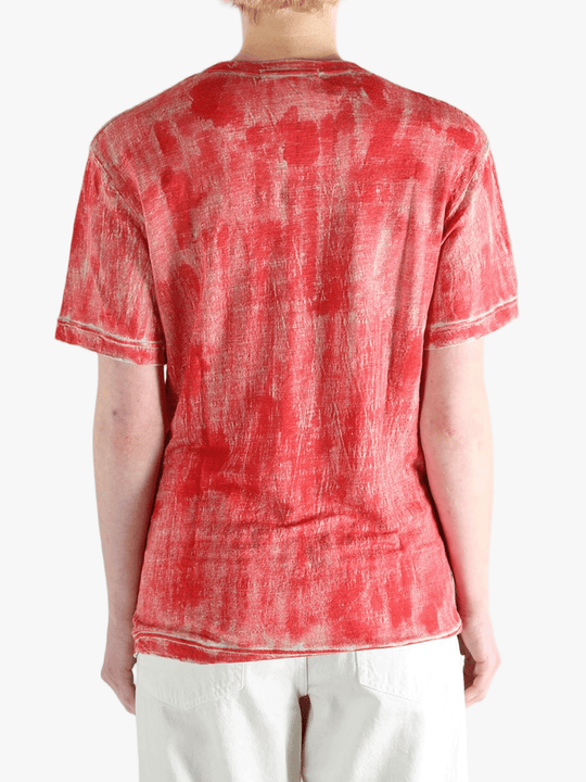 Red t-shirt worn by a person, showing the t-shirt's fit