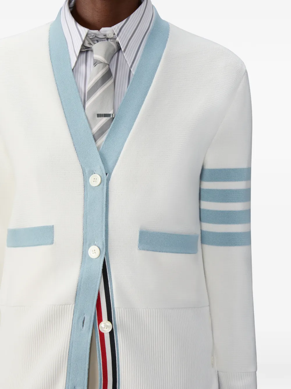 Close up of white cardigan,showing texture of the cotton fabric