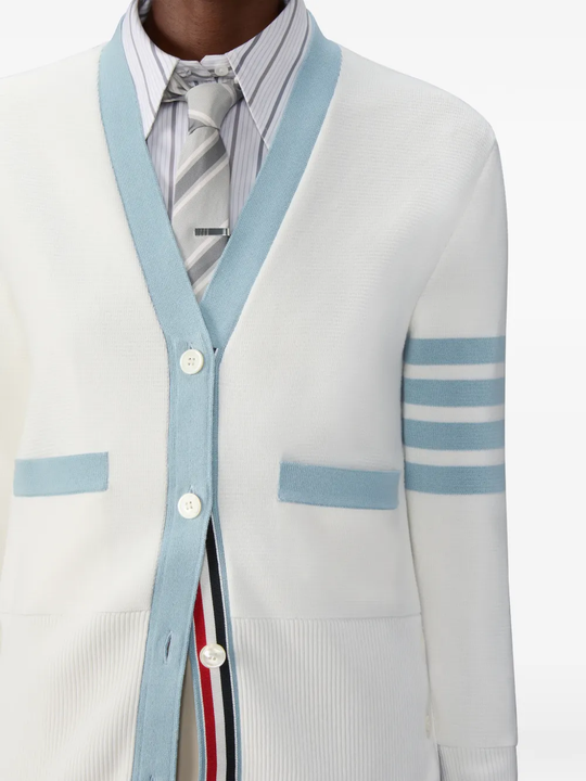 Close up of white cardigan,showing texture of the cotton fabric