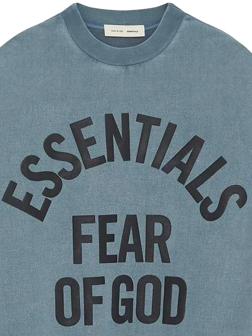 Close up of blue sweatshirt,showing texture of the cotton fabric