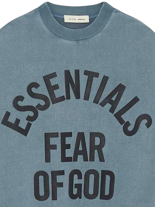 Close up of blue sweatshirt,showing texture of the cotton fabric