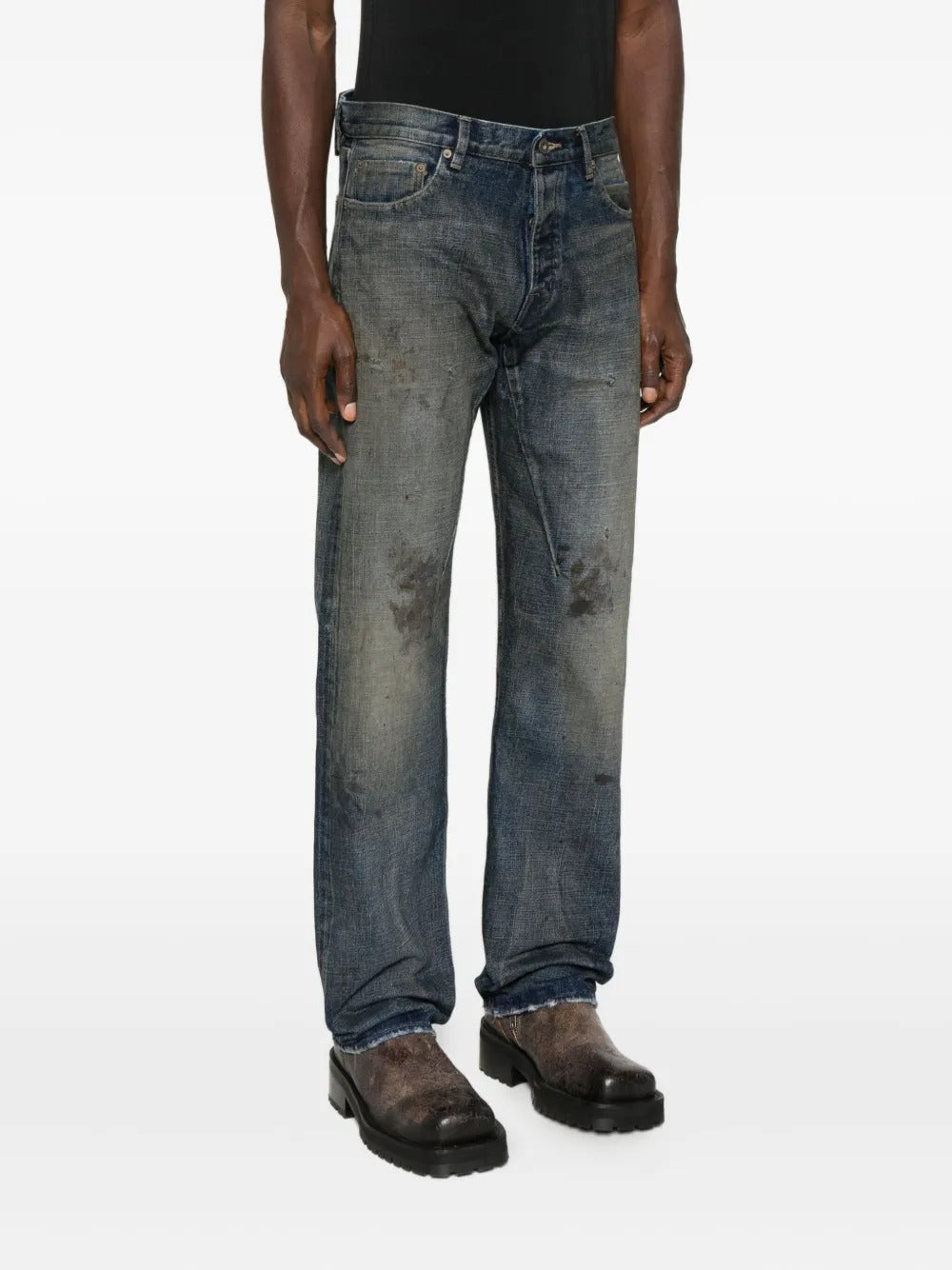 Blue jeans worn by a person, showing the jeans' fit