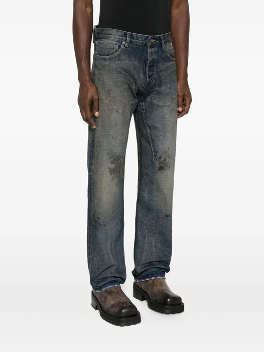 Blue jeans worn by a person, showing the jeans' fit