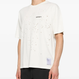 White t-shirt worn by a person, showing the t-shirt fit