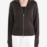 Brown knitwear worn by a person, showing the knitwear fit