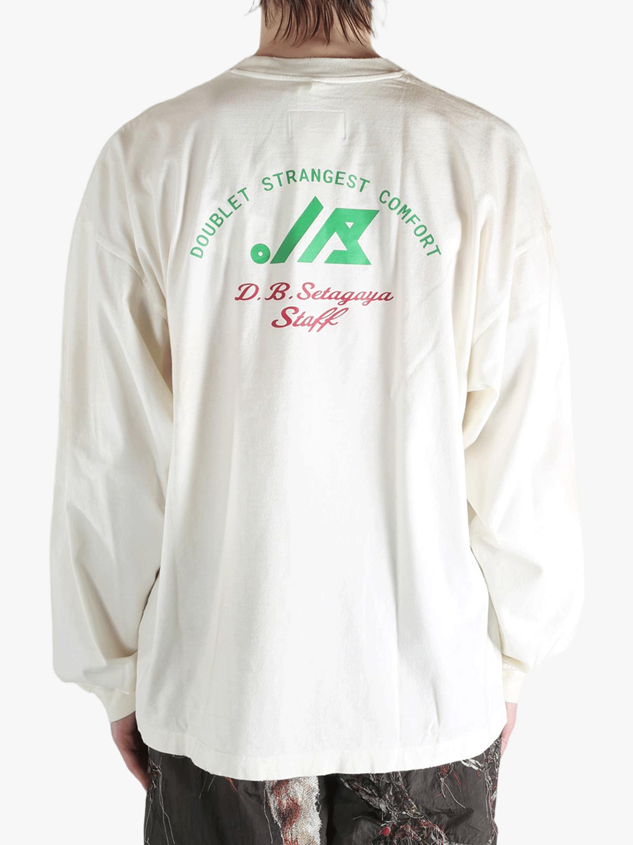 White t-shirt worn by a person, showing the t-shirt's fit