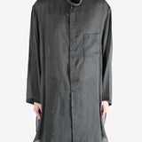 Black shirt,worn by a person, showing the shirt's fit