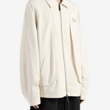 Tan jacket worn by a person, showing the jacket fit