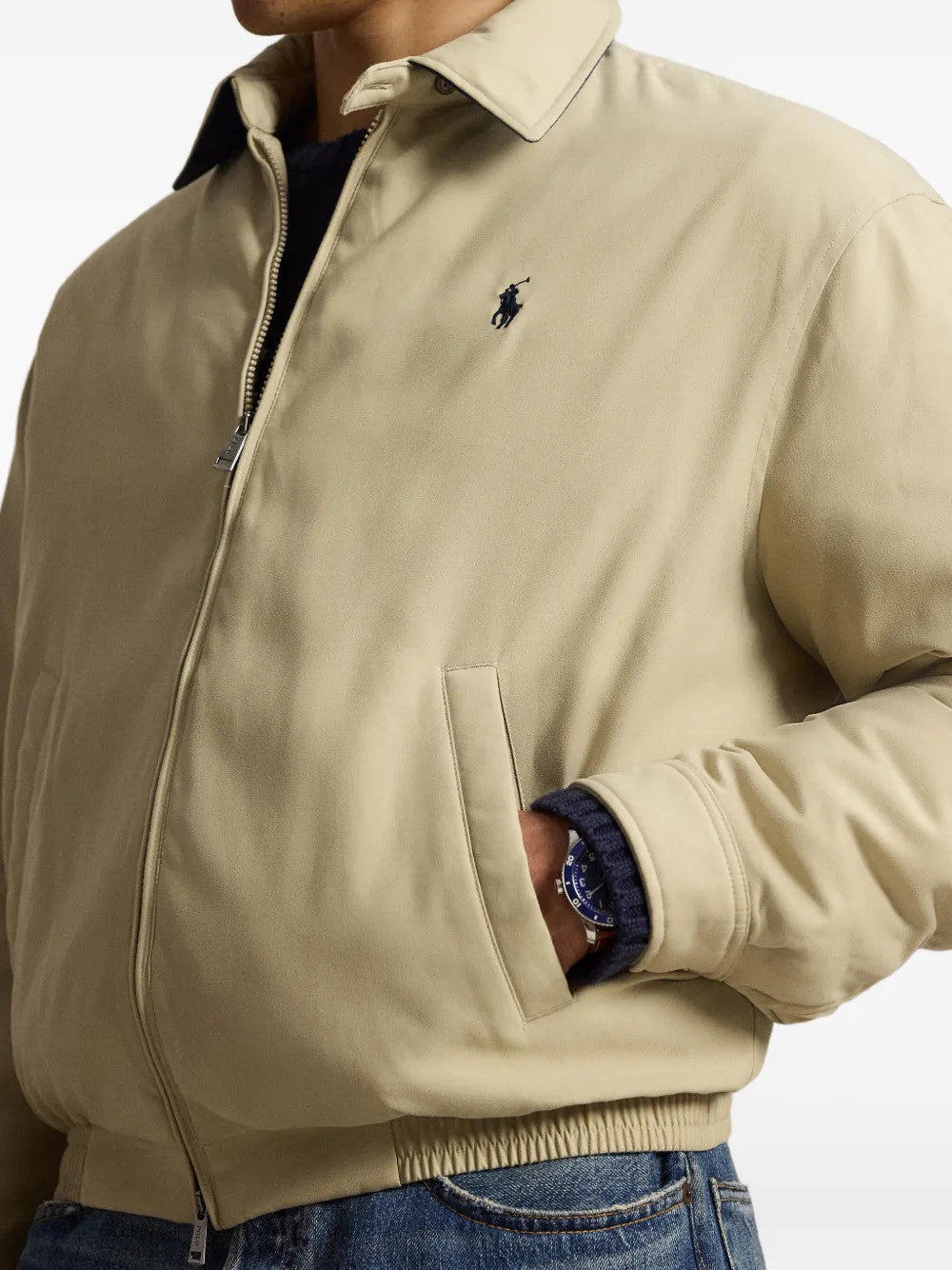Tan jacket worn by a person, showing the jacket fit