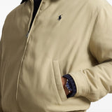 Tan jacket worn by a person, showing the jacket fit