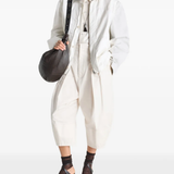 Tan jacket, full body view