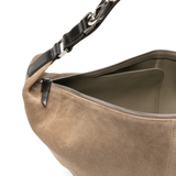 close up of brown bags, showing texture of the calf suede fabric