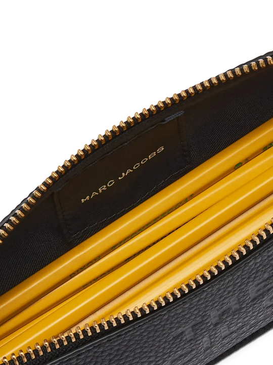 Close up of Black small accessories, showing texture of the Cow Split Leather  and Polyurethane Coating fabric