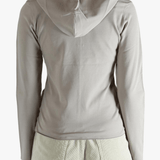Grey knitwear worn by a person, showing the knitwear fit