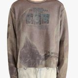 Brown top worn by a person, showing the top fit