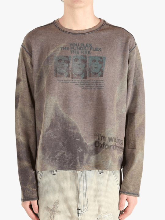 Brown top worn by a person, showing the top fit