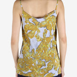 Yellow top worn by a person, showing the top's fit