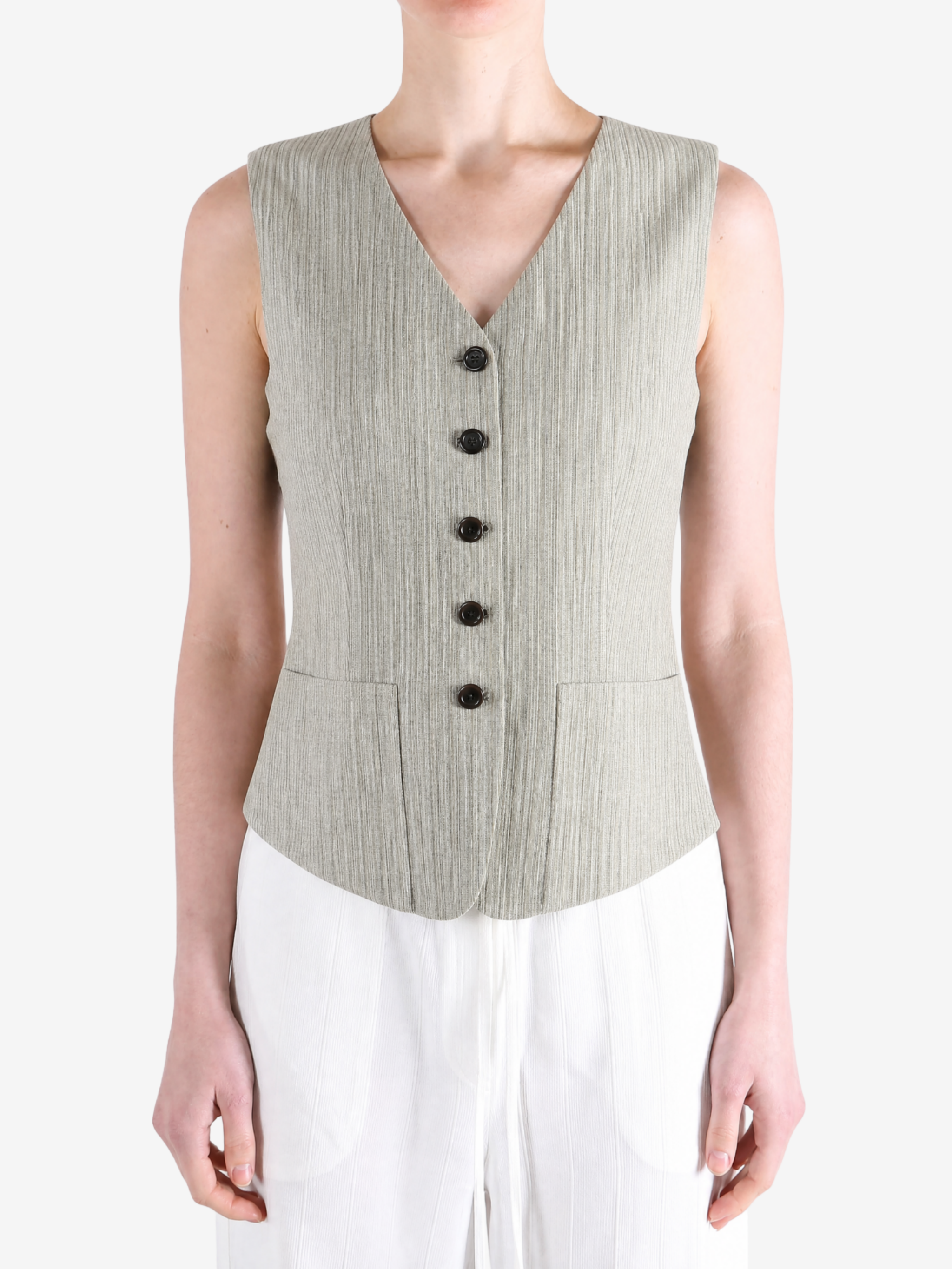 Tan top worn by a person, showing the top fit