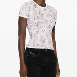 White t-shirt worn by a person, showing the shirt's fit