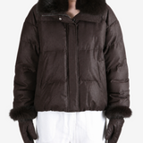 Brown jacket worn by a person, showing the jacket fit
