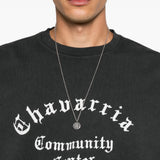 Black t-shirt worn by a person, showing the t-shirt fit
