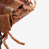 Close up of brown scarves, showing texture of the fabric