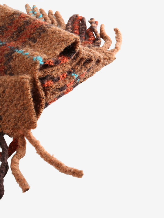 Close up of brown scarves, showing texture of the fabric