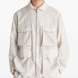 White jacket worn by a person, showing the jacket's fit
