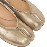 Close up of yellow flats, showing texture of the Goat Leather fabric