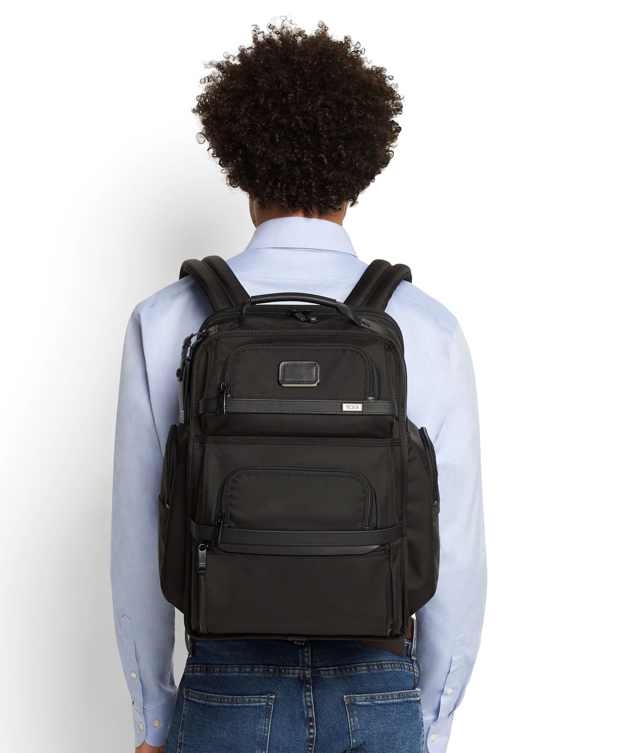 Black bag worn by a person, showing the bag fit