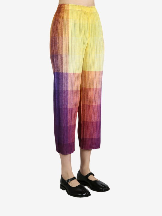 Colorful pants worn by a person, showing the pants's fit