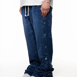 Black pants worn by a person, showing the pants fit