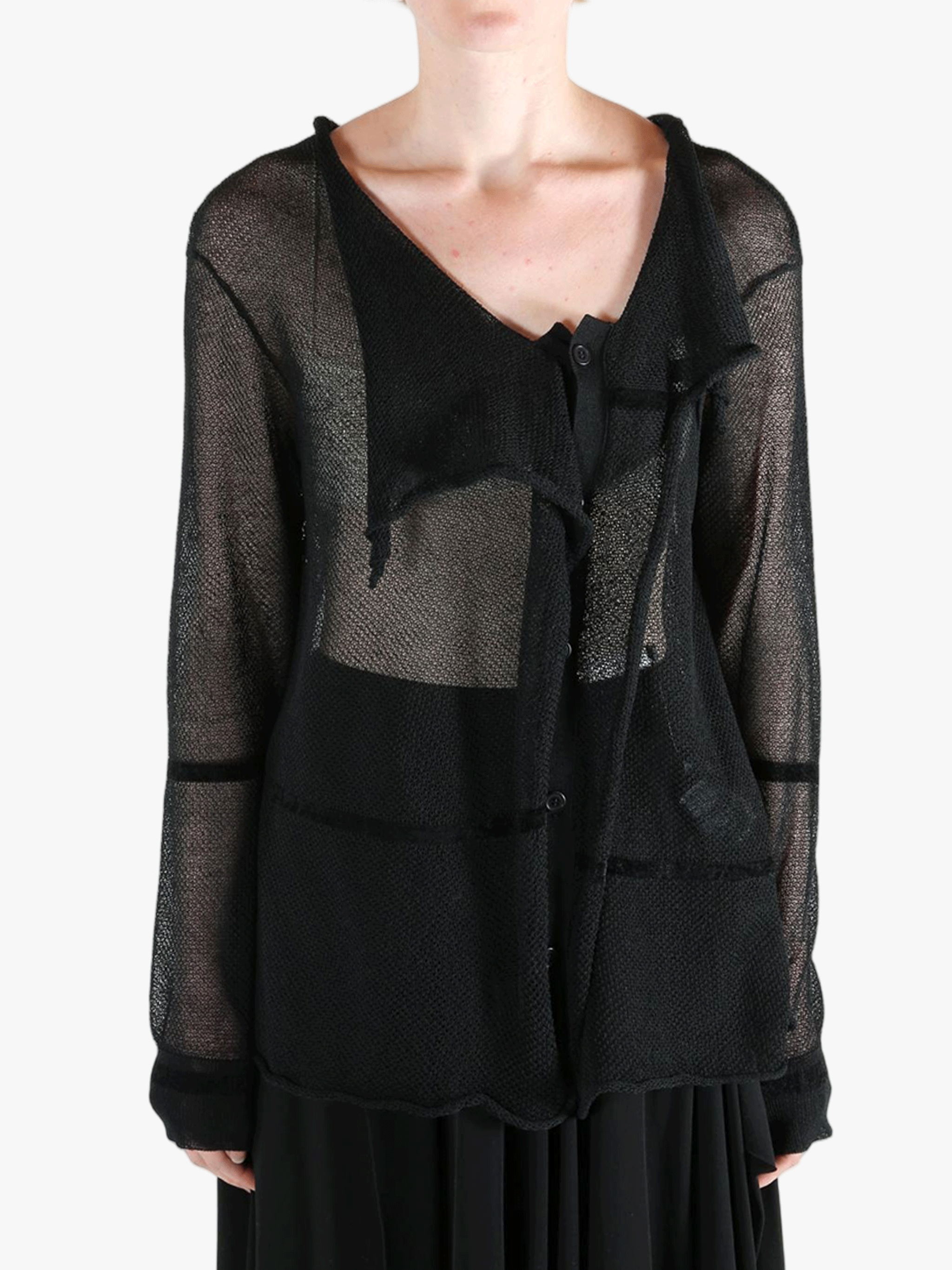 Black shirt worn by a person, showing the shirt fit