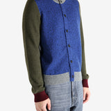 Blue sweat worn by a person, showing the sweat's fit