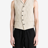 Tan jacket worn by a person, showing the jacket fit