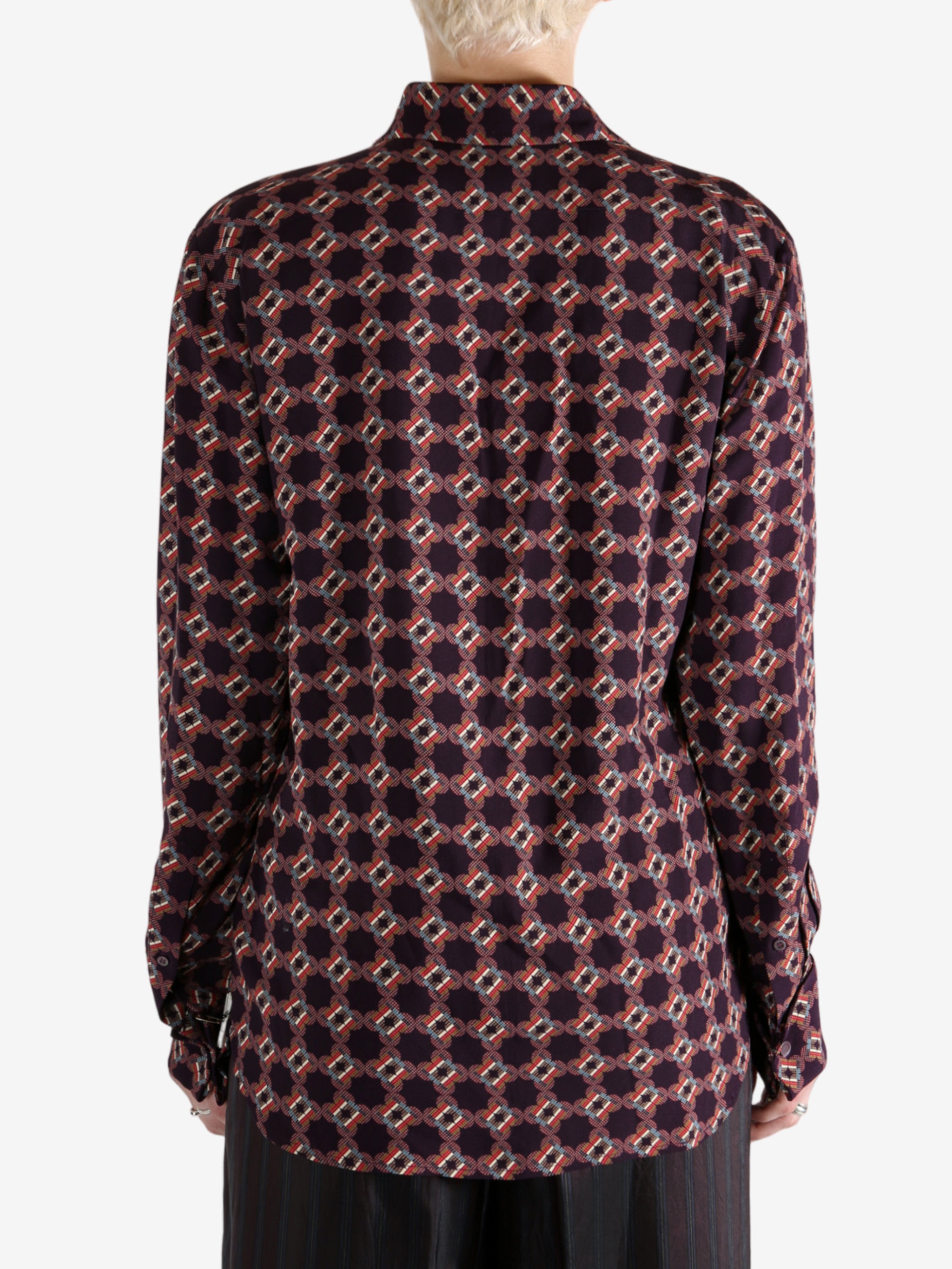 Red shirt worn by a person, showing the shirt fit