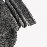 Close up of Grey accessories, showing texture of the 65% recycled cashmere/ 35% cashmere made in fabric