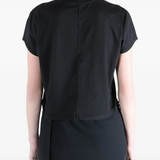 Black t-shirt worn by a person, showing the t-shirt fit