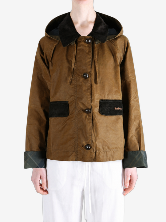 Brown jacket worn by a person, showing the jacket fit