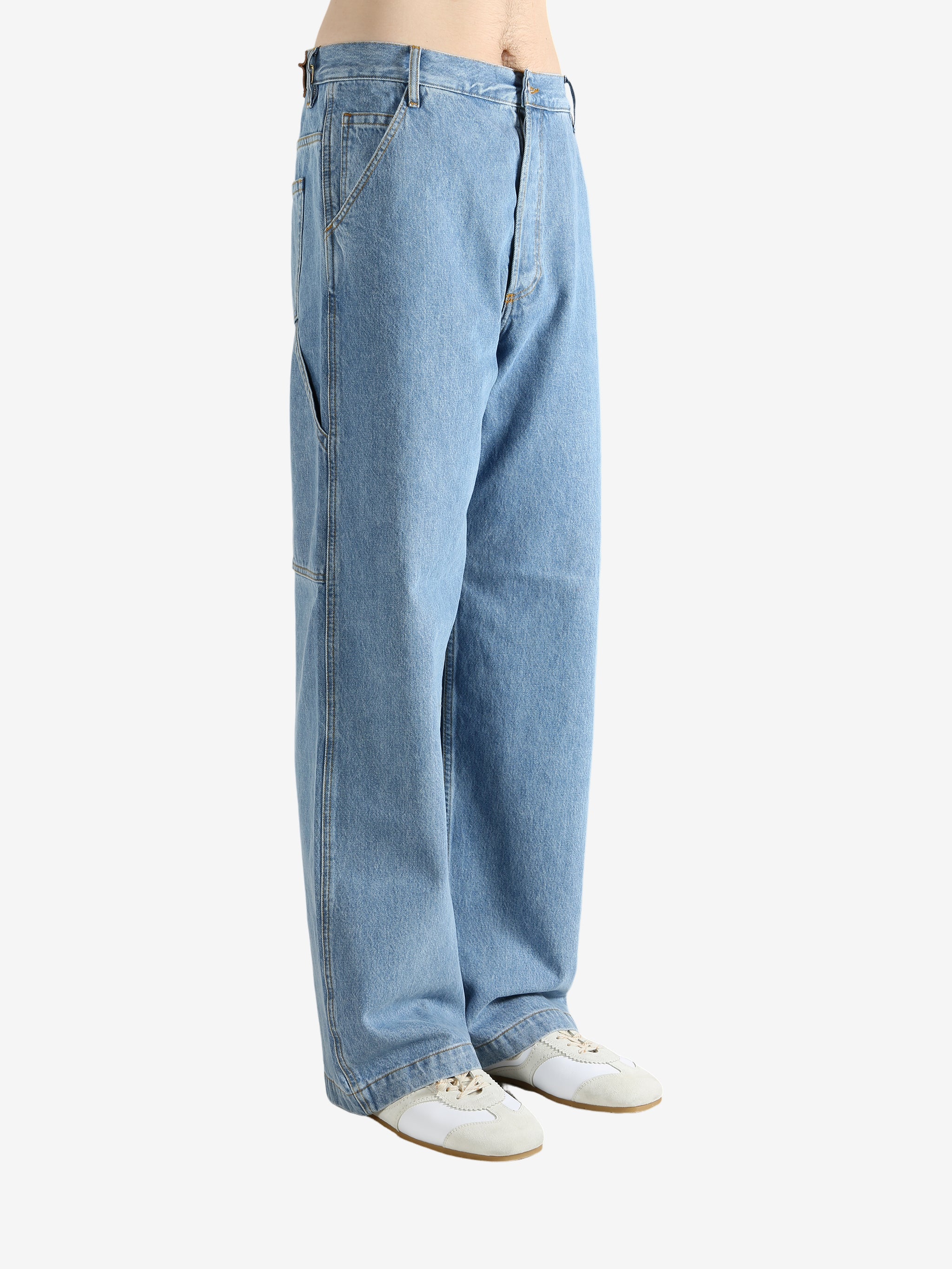 Blue jeans worn by a person, showing the jeans' fit