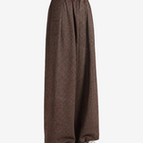 Brown pants worn by a person, showing the pants fit