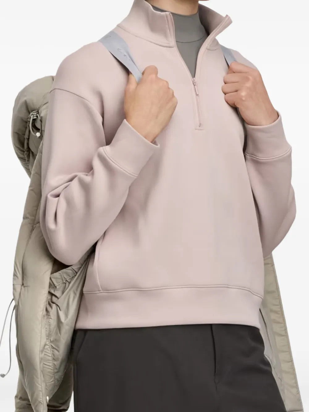 Tan jacket worn by a person, showing the jacket fit
