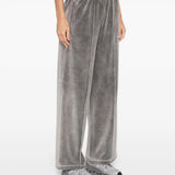 Grey pants worn by a person, showing the pants' fit