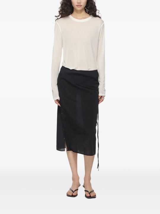 White T-shirt worn by a person, showing the T-shirt's fit