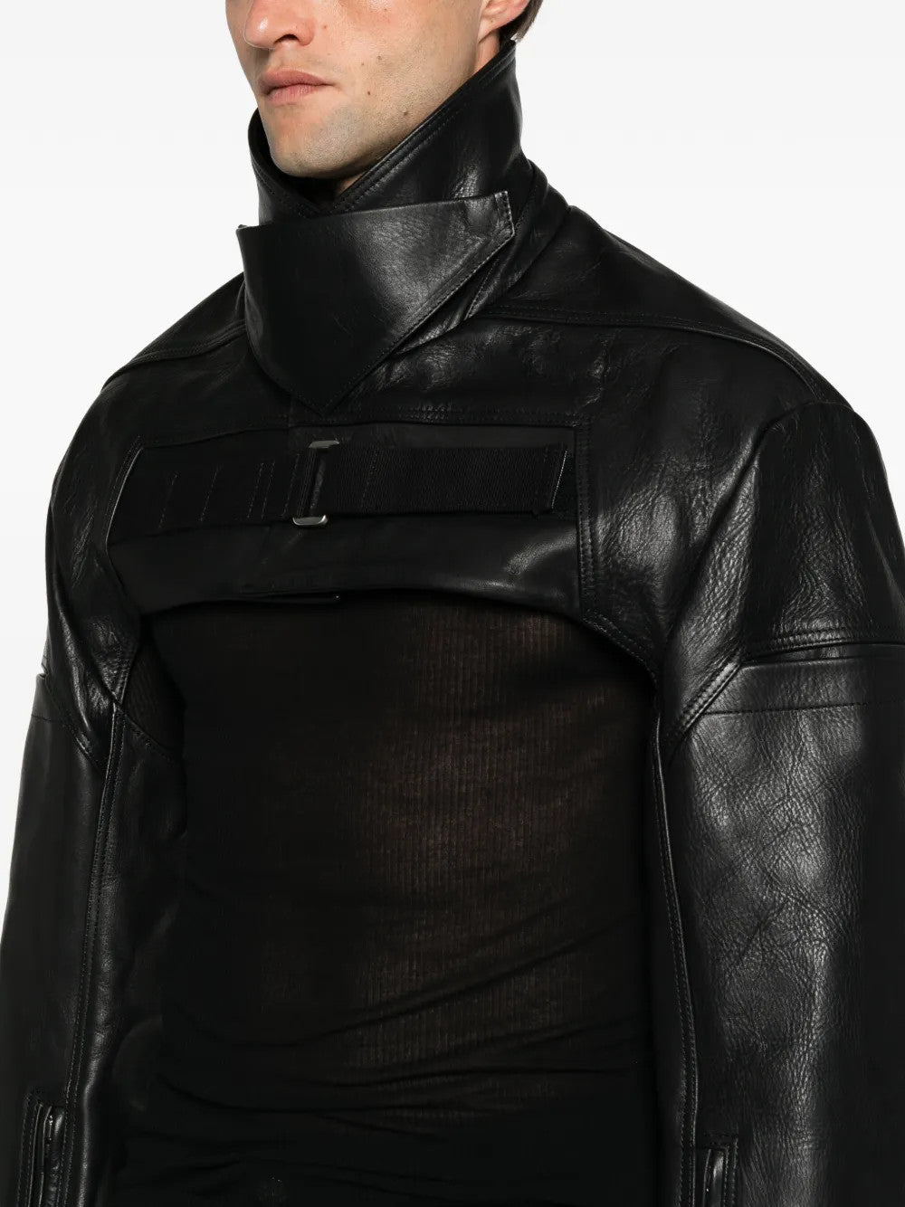 Black jacket worn by a person, showing the jacket fit