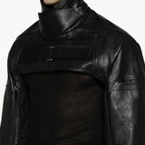 Black jacket worn by a person, showing the jacket fit