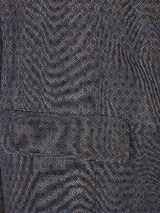Close up of blue and brown jackets-coats, showing texture of the viscose fabric