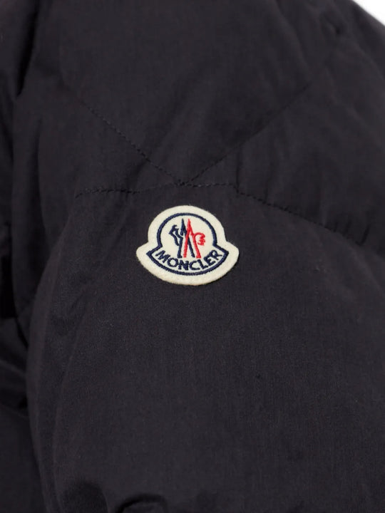 Close up of Black jacket, showing texture of the 100% cotton fabric