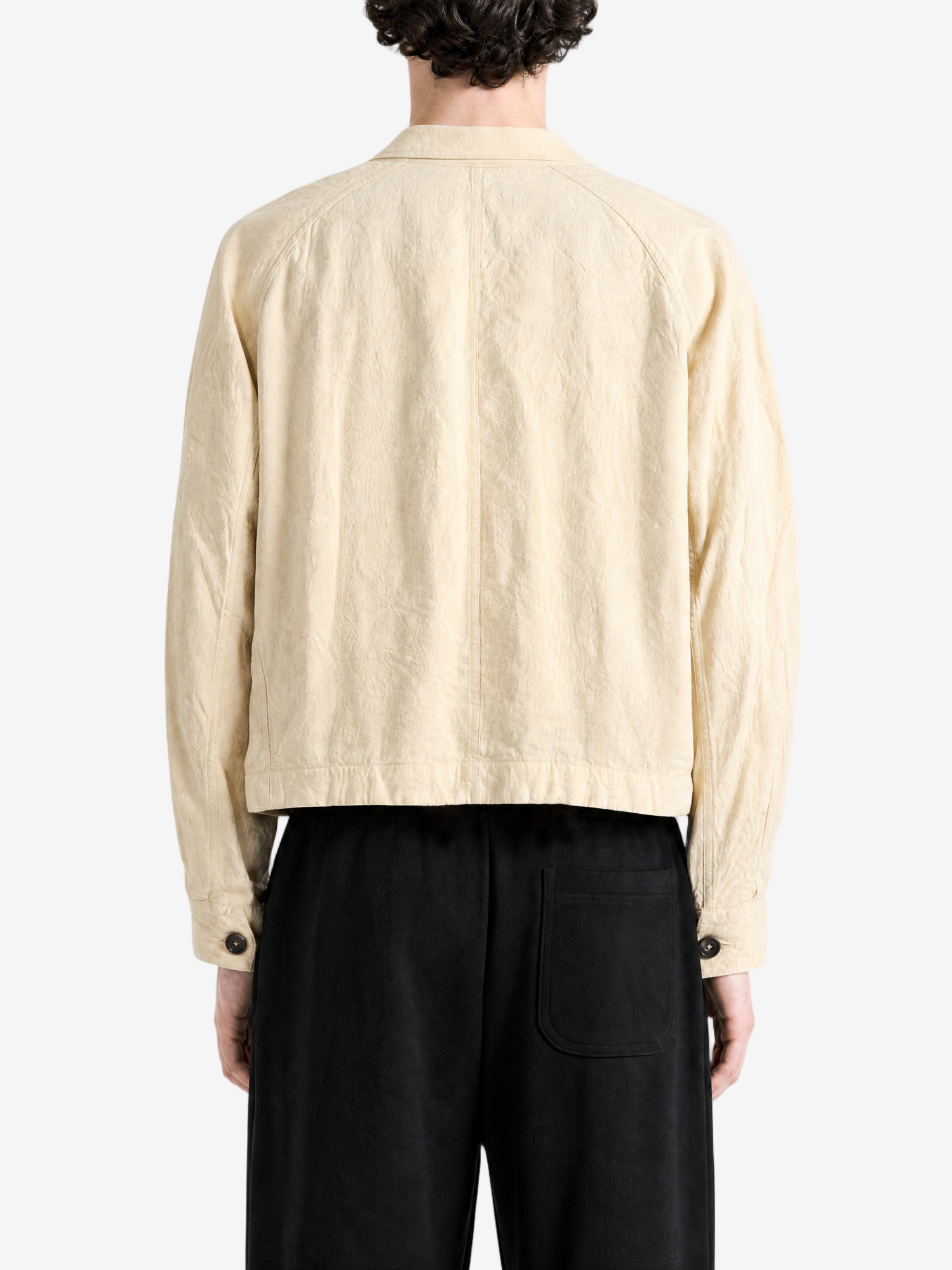 Tan jacket worn by a person, showing the tan jacket's fit
