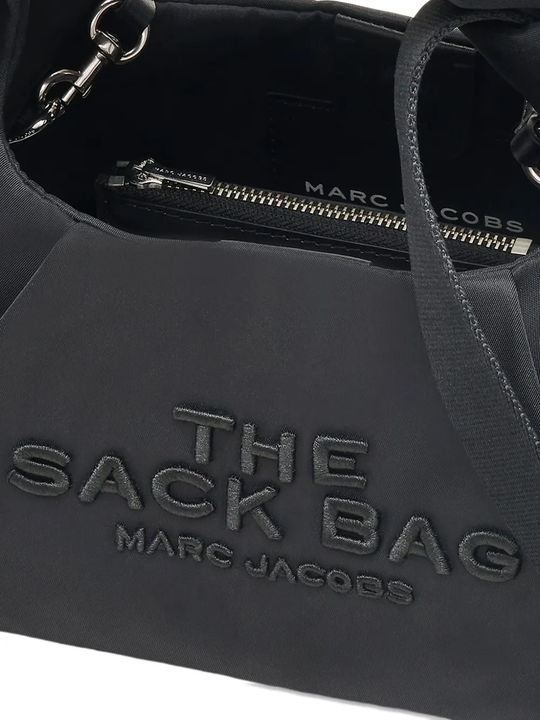 Close up of the black bag, showing texture of the nylon fabric